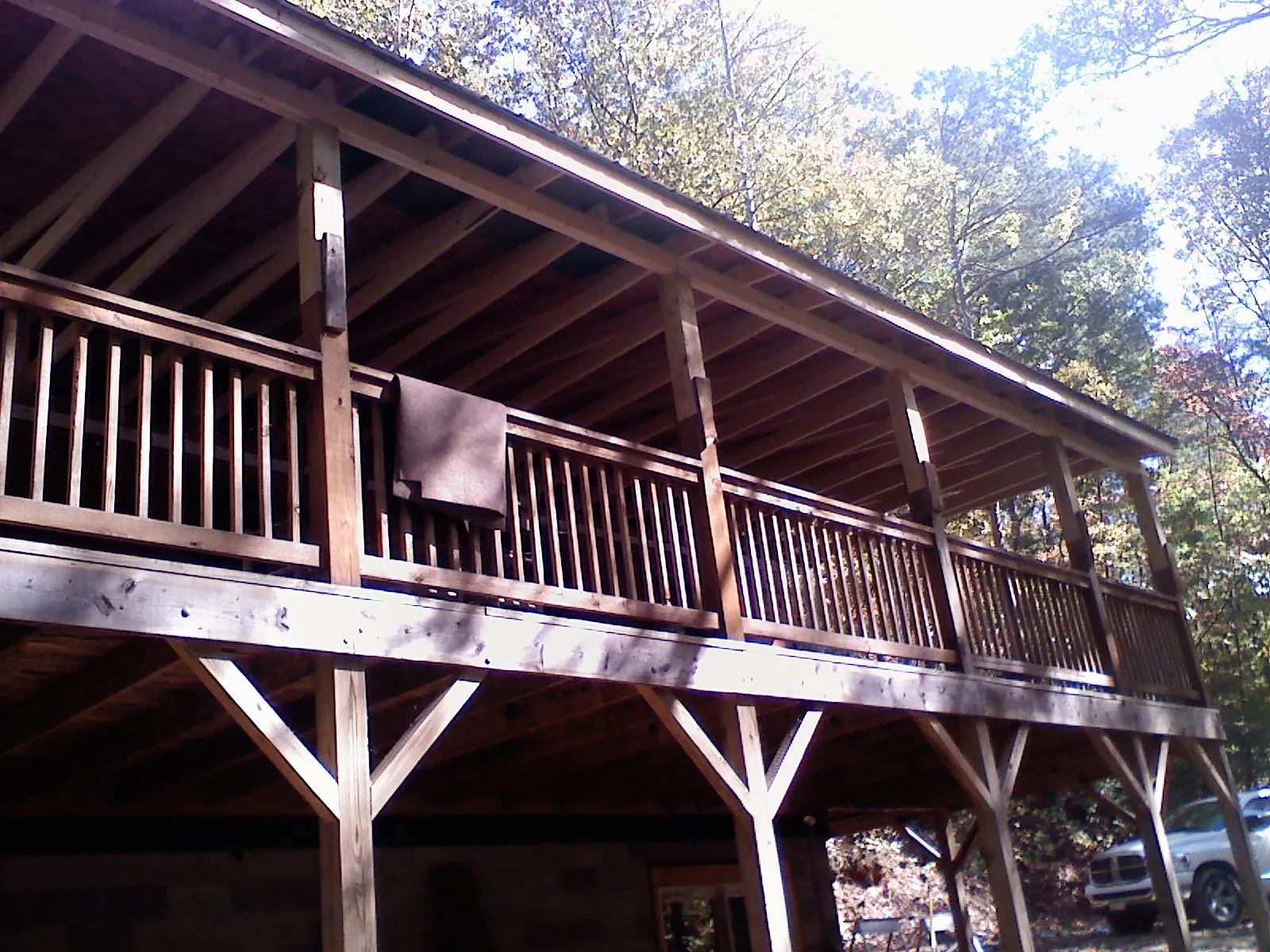 Timber framing under a new elevated porch and deck — Roof Leak Repair in Oshkosh by Roofing Brothers